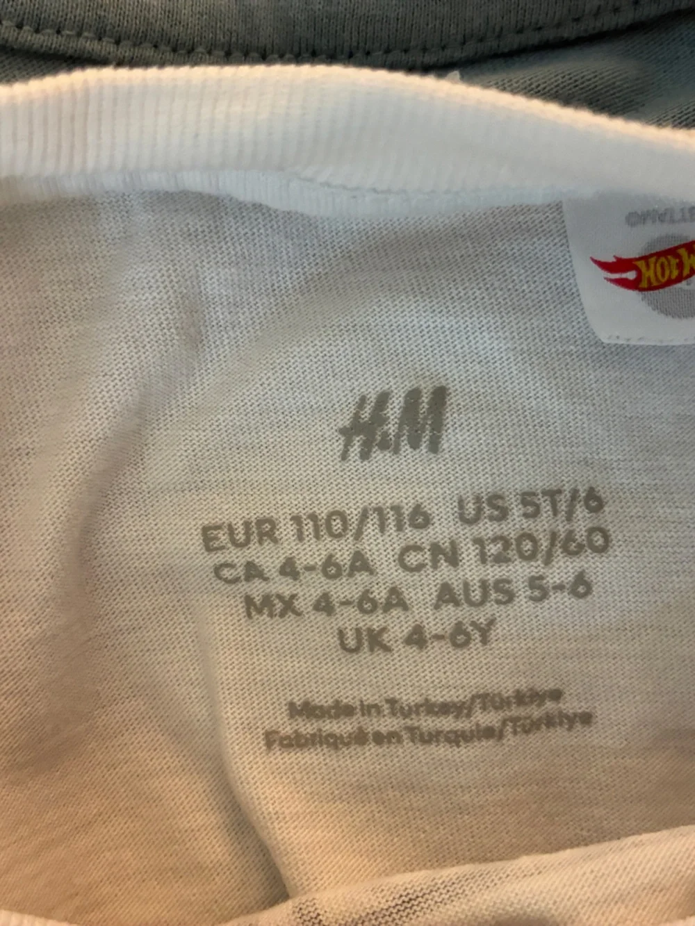 Lot of four H&M long-sleeve boys shirts.